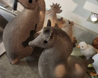 Looks like Stone Seahorses to me! 