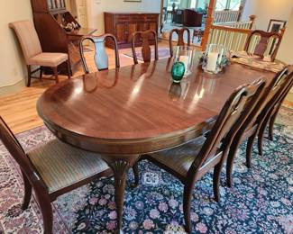 Traditional Dining Room Table and 8 Matching Chairs. Oriental Rug. 