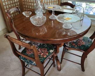 Round Table with Four Chairs - Used as a game table. 