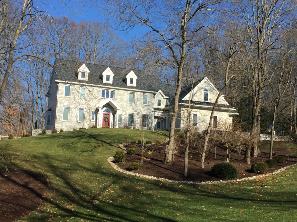 Hand tufted wool rug, appoximately 14 x 10