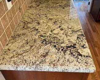 Four unique pieces of granite that have been removed and replaced.  Piece sizes are approximately:
40" x 96" Island with finished edging all the way around
29" x 86" Finished edging on three sides
25" x 97" Finished edging on two sides
25" x 55" Finished edging on two sides
This is pick up only and these countertops weigh hundreds of pounds each.  This is not getting a friend with a truck for pickup.  This will require professional moving and transportation equipment at the risk of the buyer.

