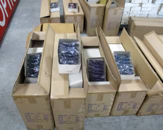 Boxes of new wrapped sealed sun glasses ready for store