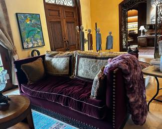 Burgandy wine   Velvet sofa side that fold down to allow for sleeping.