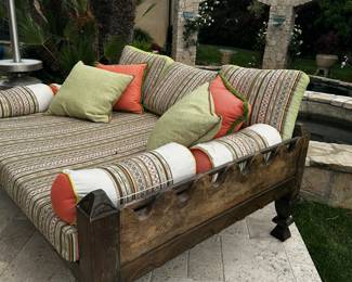 teak beds and sofas  with cushions