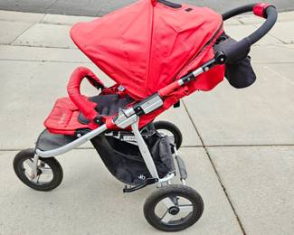 Bumbleride Indie Jogging Stroller in Cayenne Red With Strap on Double Cup Holder