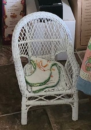 White wicker doll chair