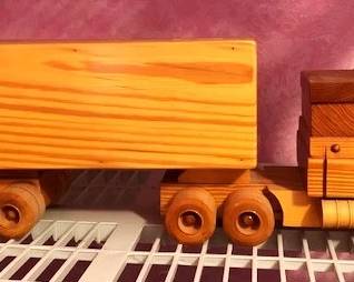 Truck is stamped "Handcrafted by Charles Winfield"