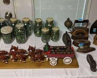 Cast- Iron Clydesdales Pulling Beer Wagon, Jars Full of Marbles, Irons, and Cast Iron Shoe Forms