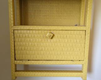 Vintage yellow wicker wall shelf/cabinet with one door and 2 shelves and one towel bar