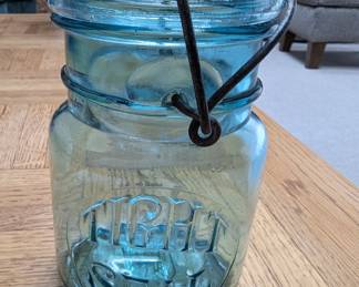 Vintage aqua blue Tight Seal pint jar with wire bail and glass lid