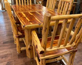Hand made log pine dining table with six chairs