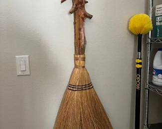 Hand made broom with carved handle