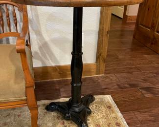 Metal base accent table with oak round top