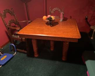 . . . antique oak five-leg table