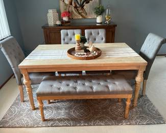 . . . farm-style table with matching chairs and bench seat