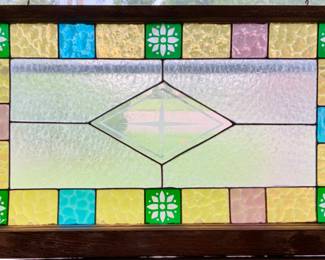 Antique Leaded Stain Glass Window with a center Diamond Pattern with a multi color squares for outer border. (34”W x 20”H)