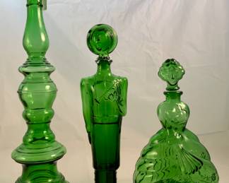 Vintage Italian glass figural bottles:  19” green glass candlestick Decanter, Forest Green Italian soldier Decanter 1980s and Impoli  emerald green glass colonial Woman decanter 11 1/2”