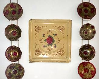 Wall Grouping with a collection of Antique Goofus Glass (1890’s - 1920’s) Bowls (4) and Plates (4) in the traditional reverse painting of red florals and gold.  Displayed in wire metal Plate Racks on either side of a Antique Hand Painted Rose Ceiling Tile (25” x 25”)