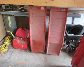 Auto ramps. Gas cans, extension cords, lawn spreader.