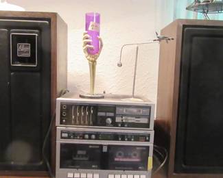 Cassette player/AM/FM radio and two speakers, I have been listening to radio while working. Item does need cleaning.