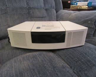Bose wave radio/CD with instructions and remote, tested radio works.