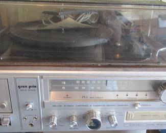 Cassette player with turntable and 8 track