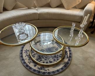 MCM brass and glass three tiered swivel coffee table