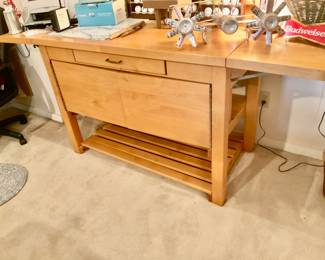 Light Wood Butcher block Storage Table with adjustable, extended leafs 