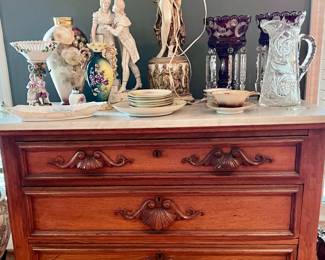 Flame mahogany drawers with marble top. 