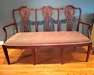 Turn of the century mahogany settee.