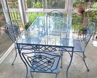 Breakfast glass topped table with chairs, powder coated in a soft purple. 