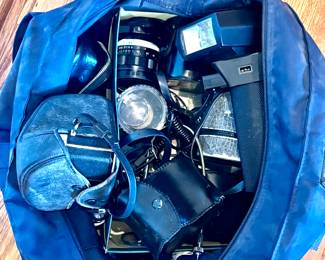 Photographers bag of all sorts. Lenses, cameras, lighting & more. 