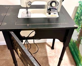 Unusual sewing machine set in gorgeously detailed setting 