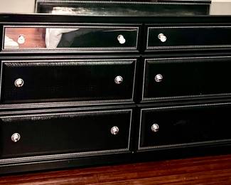 Dresser with top mirrored drawers, bottom 2 accented in black leather