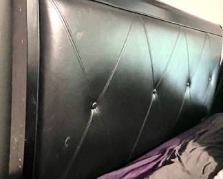 Detail of queen headboard blk leather