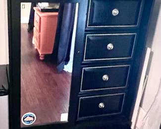 Dresser mirrored with leather accented drawers