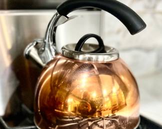 Copper tea kettle whistling