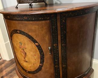 Demi globe liquor cabinet.