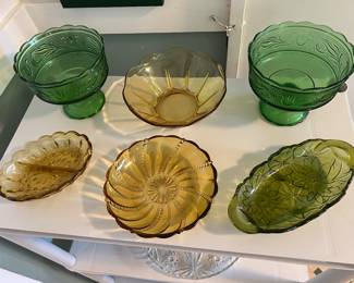 E O Brody green glass candy dish
Amber/golden glass dishes
Avocado green relish dish