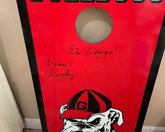 Corn hole game signed by Vince Dooley