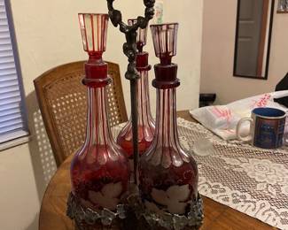 Glass serving bottles with carrier.