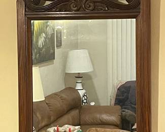 Antique (?) heavy carved wood frame mirror.