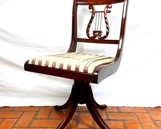 Circa 1950 Regency revival swivel chair 
