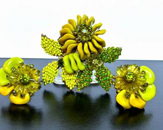 Miriam Haskell brooch with matching earrings.......To register so you can place bids go to www.capitolsalesservices.hibid.com