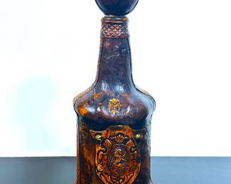 Vintage Italian leather clad decanter bottle 