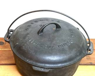 Old Griswold cast  iron No 9 dutch oven with a tite-top lid