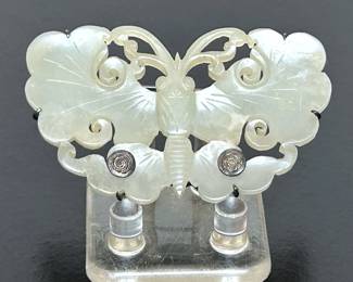 Circa 1930 butterfly carved jade brooch .......To register so you can place bids go to www.capitolsalesservices.hibid.com