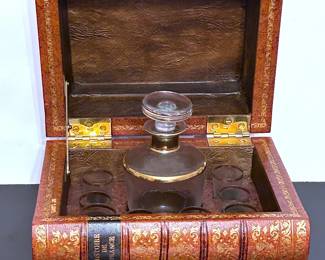 Mid century French Leather Faux Books Liquor Decanter Box.......To register so you can place bids go to www.capitolsalesservices.hibid.com