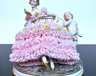 A porcelain 'Dresden Lace' figurine made by Anton Mueller's Mueller  Volkstedt of Thuringia, Germany  prior to WWII