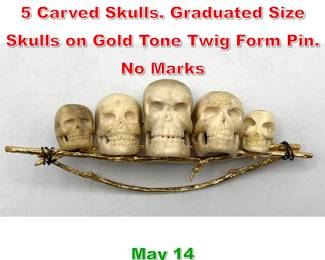 Lot 322 Memento Mori Brooch with 5 Carved Skulls. Graduated Size Skulls on Gold Tone Twig Form Pin. No Marks